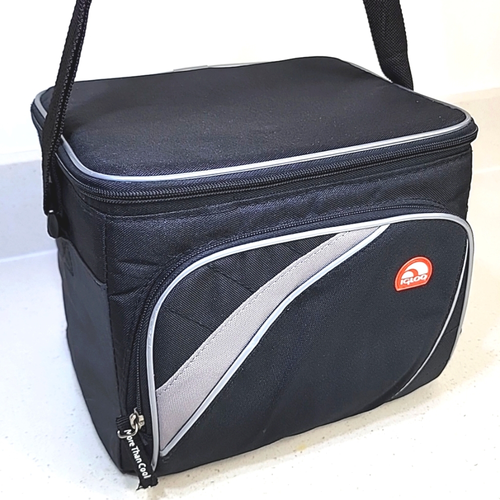 IGLOO Cooler, Hard interior with adjustable strap.